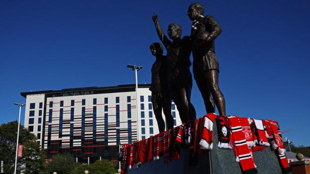 The United Trinity statue at Old Trafford