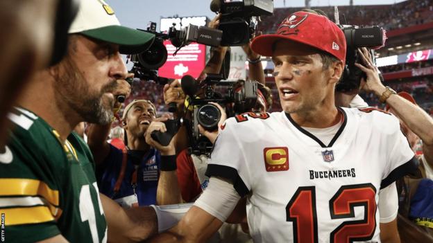 Aaron Rodgers with Tom Brady