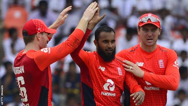 England captain Eoin Morgan congratulates bowler Adil Rashid on taking a wicket v Sri Lanka