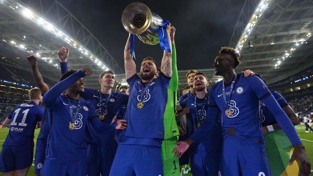 Olivier Giroud celebrates lifting the Champions League with Chelsea