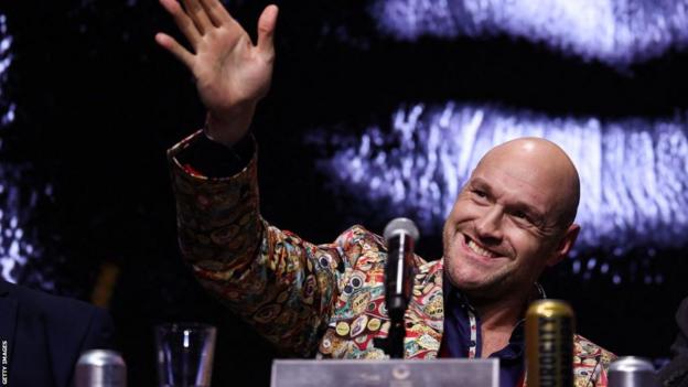 Tyson Fury waves to the crowd