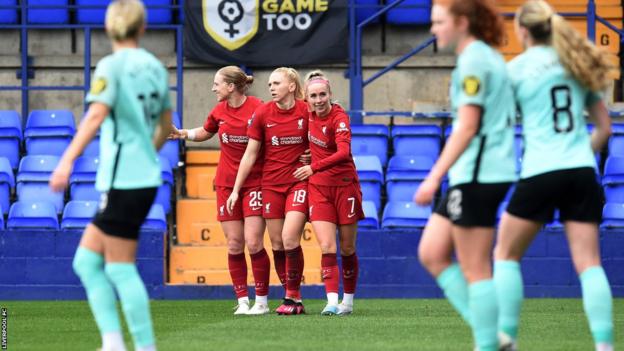 Liverpool celebrate after scoring against Brighton
