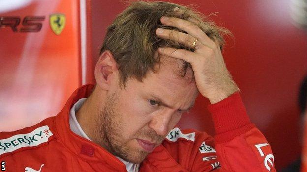 Sebastian Vettel looks dejected after qualifying