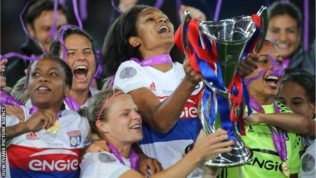 Olympique Lyonnais players with the Uefa Women's Champions League trophy