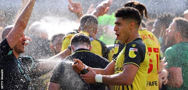 Watford players celebrate promotion