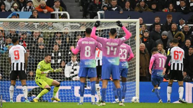 Martin Dubravka looks to make a save for Newcastle against AC Milan