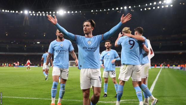 Manchester City celebrate a goal against Arsenal