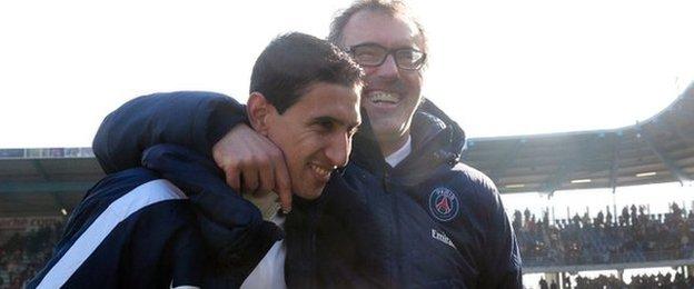 Laurent Blanc celebrates with Angel Di Maria after PSG clinch the Ligue 1 title