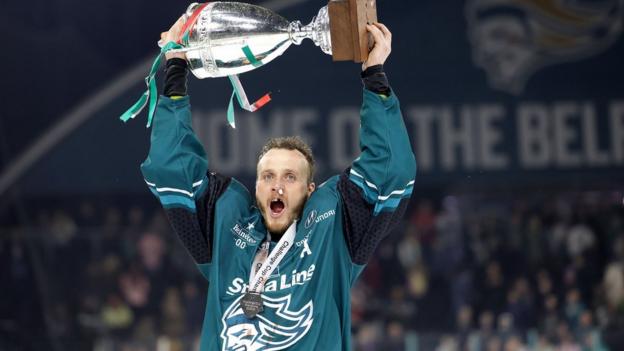Giants forward Mark Cooper celebrates post-match with the Challenge Cup