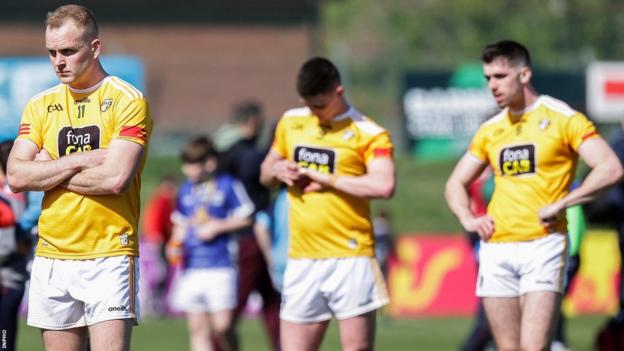 Antrim players looked dejected after last year's Ulster Championship defeat by Cavan