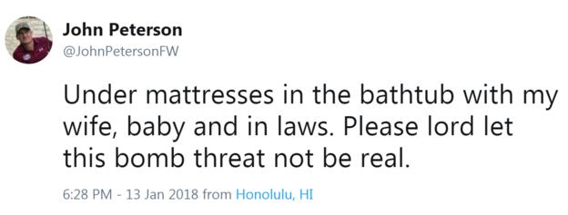 John Peterson tweet reading: Under mattresses in the bathtub with my wife, baby and in-laws. Please lord let this bomb threat not be real