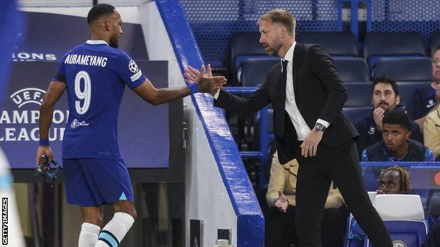 Pierre Emerick Aubameyang high fives Graham Potter