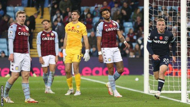 Aston Villa players look dejected after conceding against West Ham