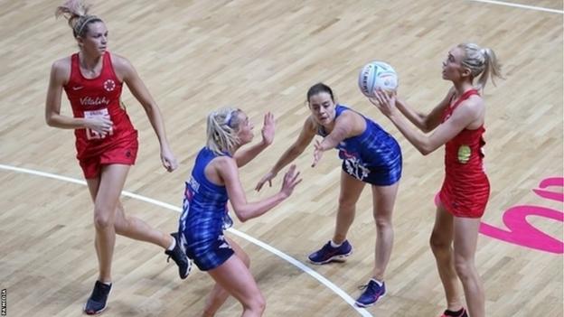 England's Helen Housby (right) in action against Scotland