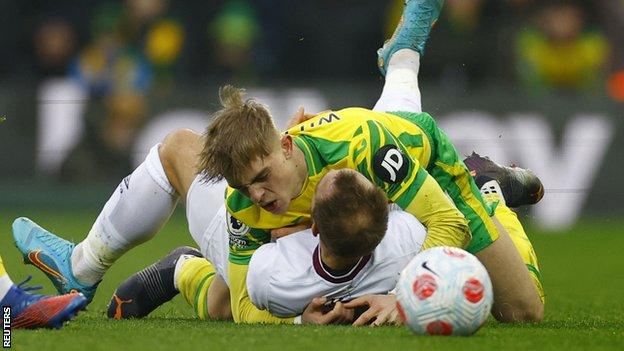 Brentford's Christian Eriksen fouls Norwich's Brandon Williams