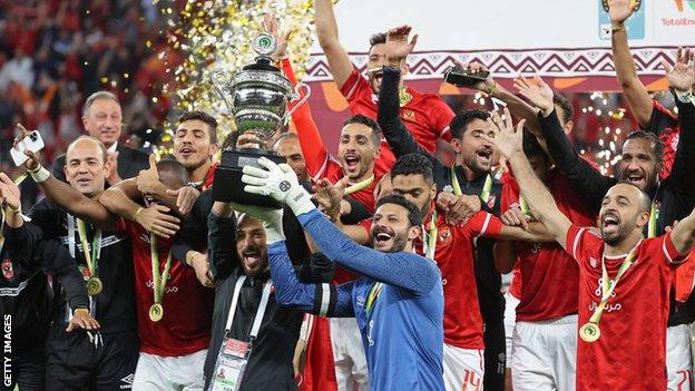 Al Ahly players celebrate after winning the Caf Super Cup