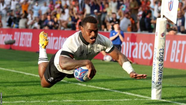 Fiji's Josua Tuisova scores a try against Australia