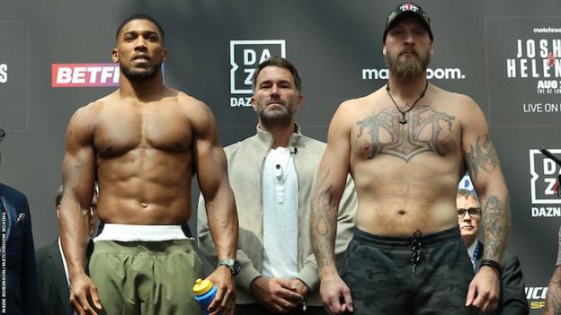 Anthony Joshua and Robert Helenius pose for the cameras at Friday's weigh-in
