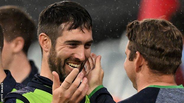 Ireland captain Andrew Balbirnie celebrates after his team's victory at the MCG