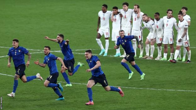 Players of Italy celebrate following victory in the penalty shoot out