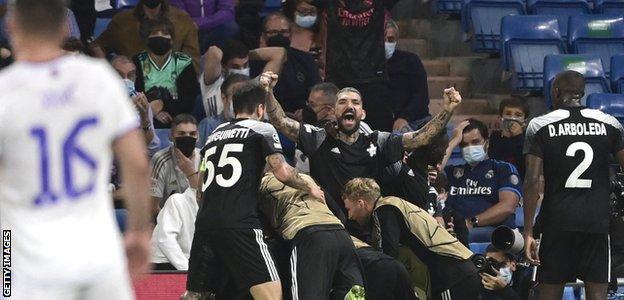 Sheriff Tiraspol players celebrate their second goal against Real Madrid in the Bernabeu