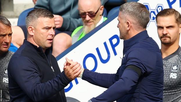 Plymouth Argyle manager Steven Schumacher and Preston boss Ryan Lowe shake hands