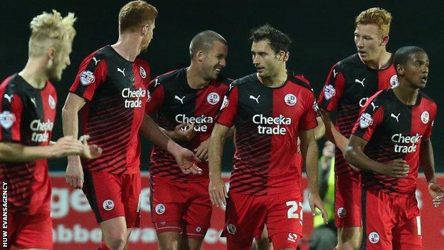 Crawley celebrate Gwion Edwards' first goal at Rodney Parade