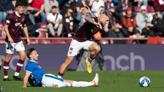 Ben Davies made his Rangers return in the weekend win at Hearts and could face his old club at Anfield