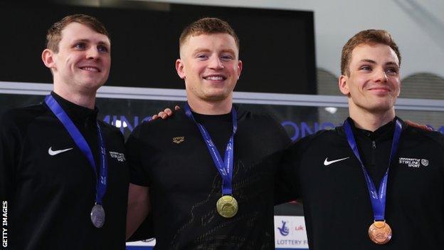 Ross Murdoch, Adam Peaty and Craig Benson pictured on the podium at the British Championships in April 2019