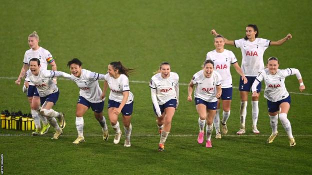 Tottenham celebrate after beating Manchester City on penalties