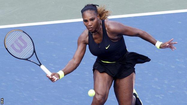 Serena Williams returns a shot in the Western & Southern Open