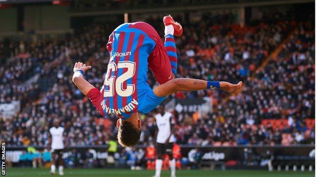 Pierre-Emerick Aubameyang celebrates with his trademark somersault