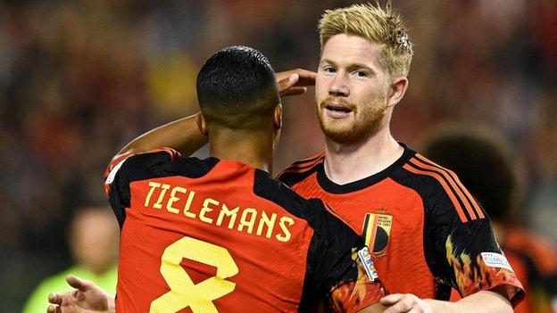 Kevin De Bruyne (right) celebrates with Youri Tielemans