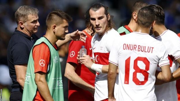 Turkey manager Stefan Kuntz talks to his players