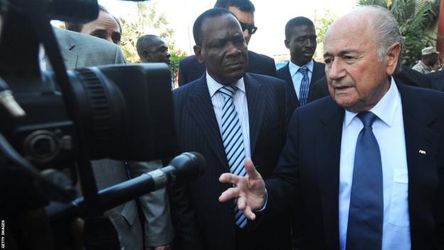 Yves Jean-Bart (left) welcomes ex-Fifa president Sepp Blatter (right) to Haiti in 2013
