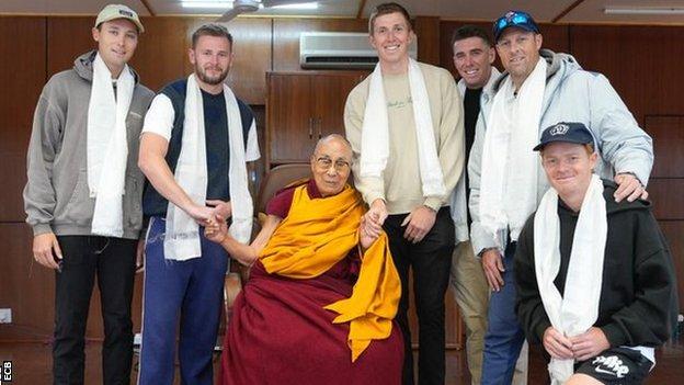 Some members of the UK travel group meet the Dalai Lama on Wednesday