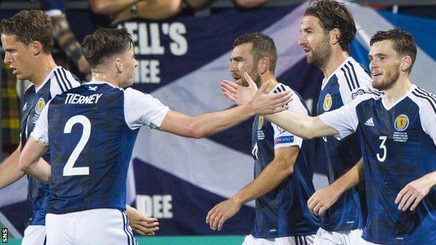 Scotland full-backs Kieran Tierney and Andy Robertson shake hands