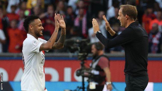 Neymar and Thomas Tuchel embrace