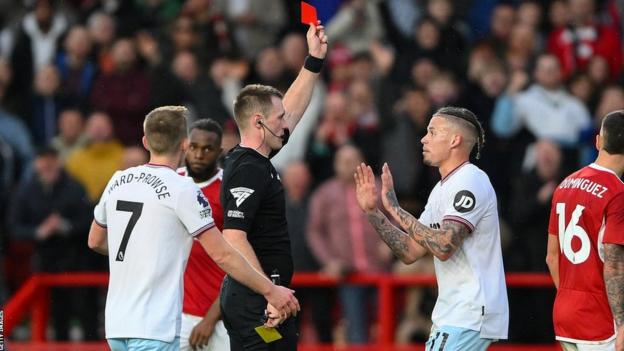 Kalvin Phillips being shown the red card by referee Thomas Bramall at Nottingham Forest