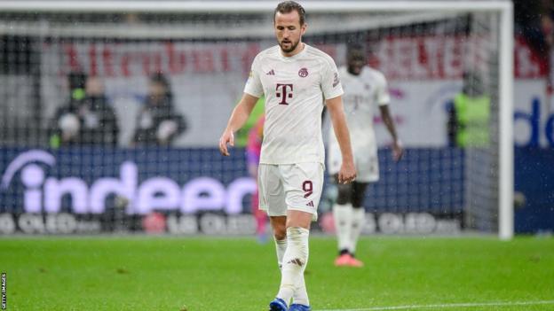 England and Bayern Munich striker Harry Kane looks dejected