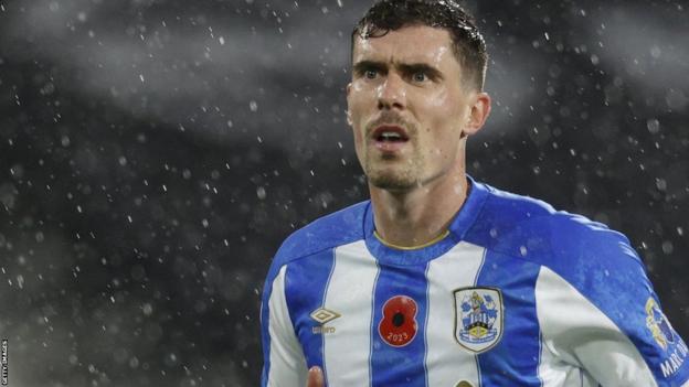 Josh Ruffels: Huddersfield Town defender ruled out for season with ...