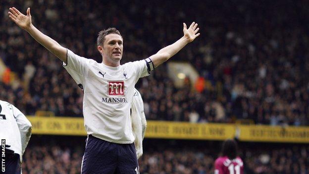 Robbie Keane celebrates a goal for Tottenham