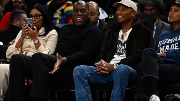 Earvin 'Magic' Johnson and Pharrell Williams at the NBA game in Paris