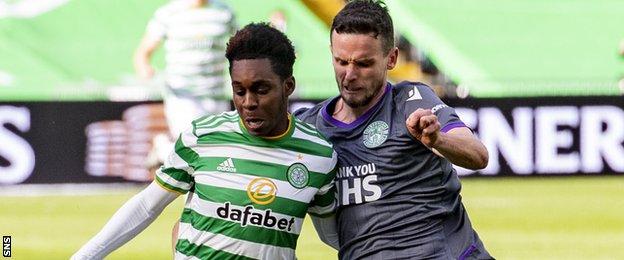 Celtic's Jeremie Frimpong in action against Hibs' Paul McGinn