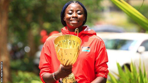 Angella Okutoyi with the African junior trophy