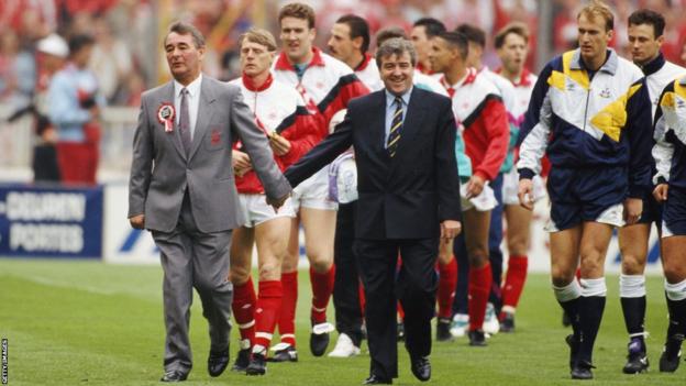 Nottingham Forest's Brian Clough and Tottenham's Terry Venables lead the teams out hand in hand before the 1991 FA Cup final