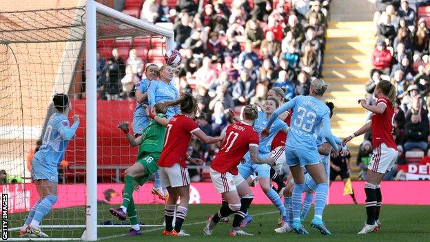 Katei Zelem scores from a corner