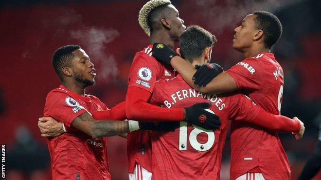 Manchester United players celebrate