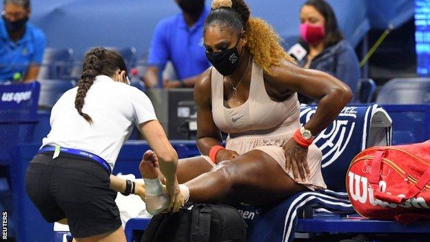 Serena Williams having treatment on her foot