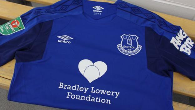 An Everton shirt with the Bradley Lowery Foundation logo on the front